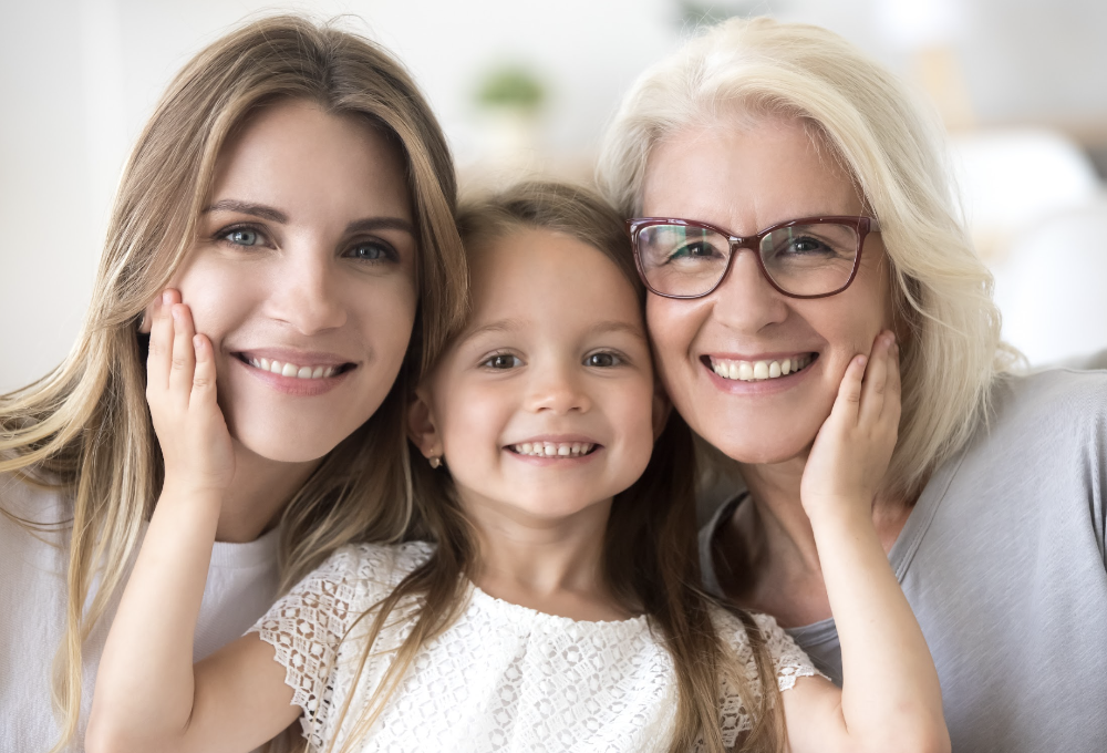 three generation of women smiling