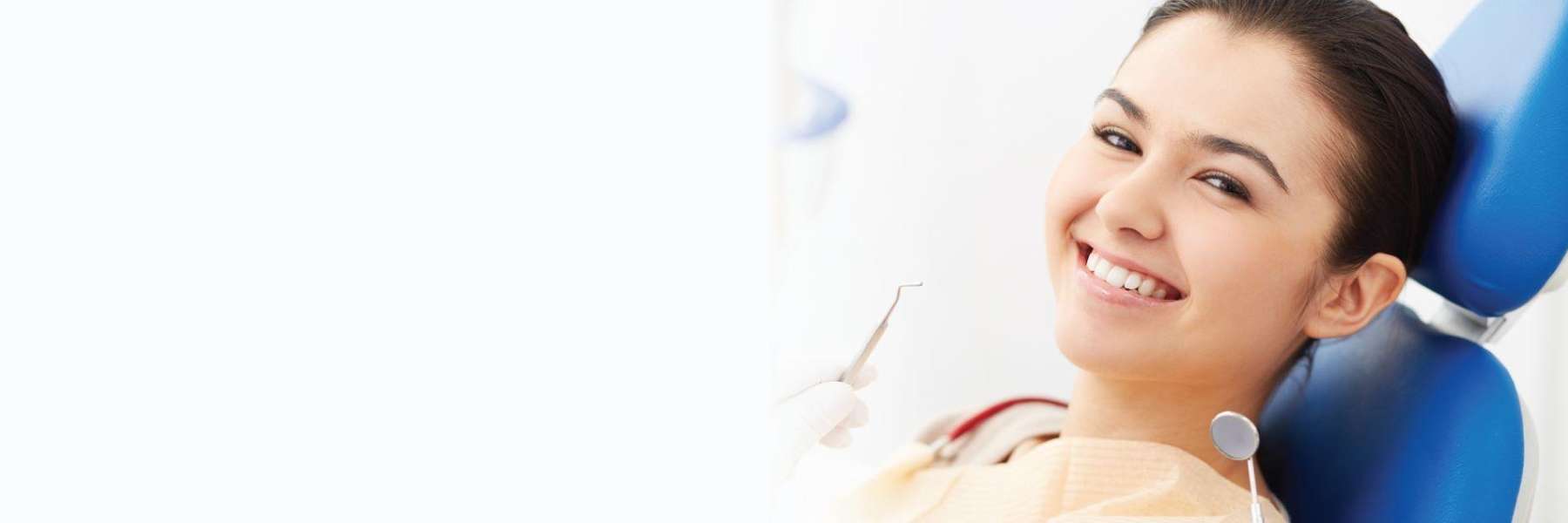 woman getting a teeth cleaning in knoxville